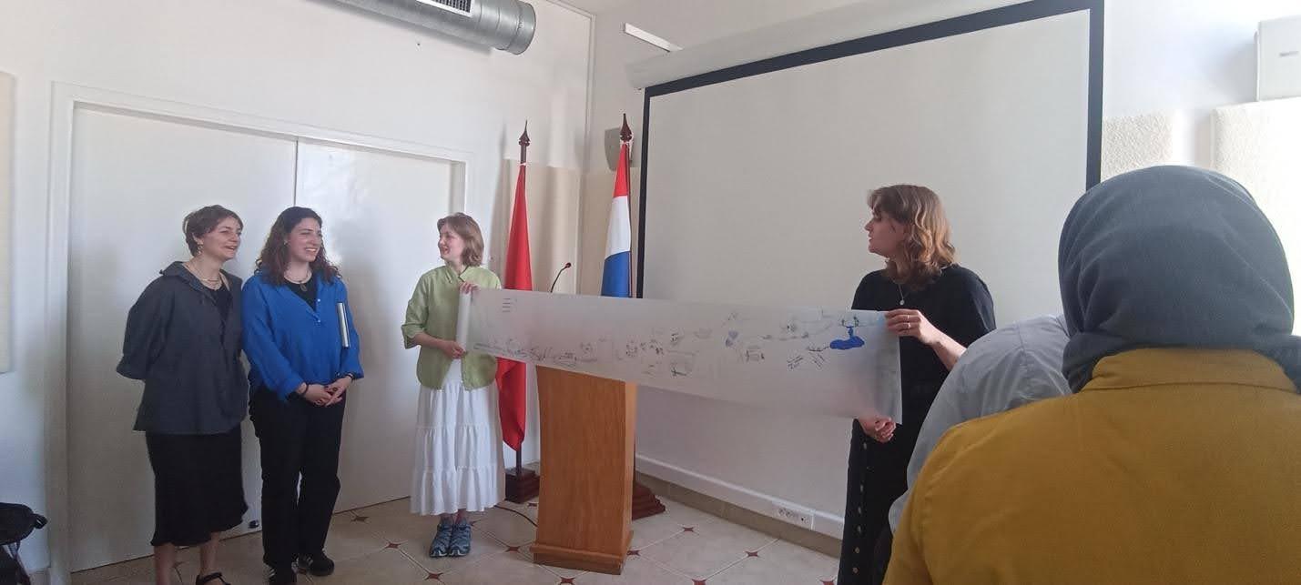 Students presenting their urban and territorial analyses of water in public spaces at NIMAR.