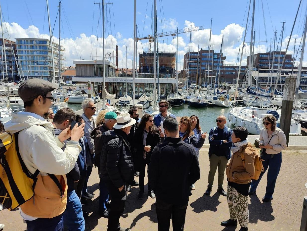 Figure 2. NXR-2024 site visit and dialogue with local and international stakeholders of the Port of Scheveningen— including municipal specialists, Cultural Heritage Agencies, academics, local inhabitants, and port-related workers—whose insights serve as a valuable backbone for the project’s learning and outcomes. Source: Mila Avellar Montezuma and Marlies Augustijn, 2024.