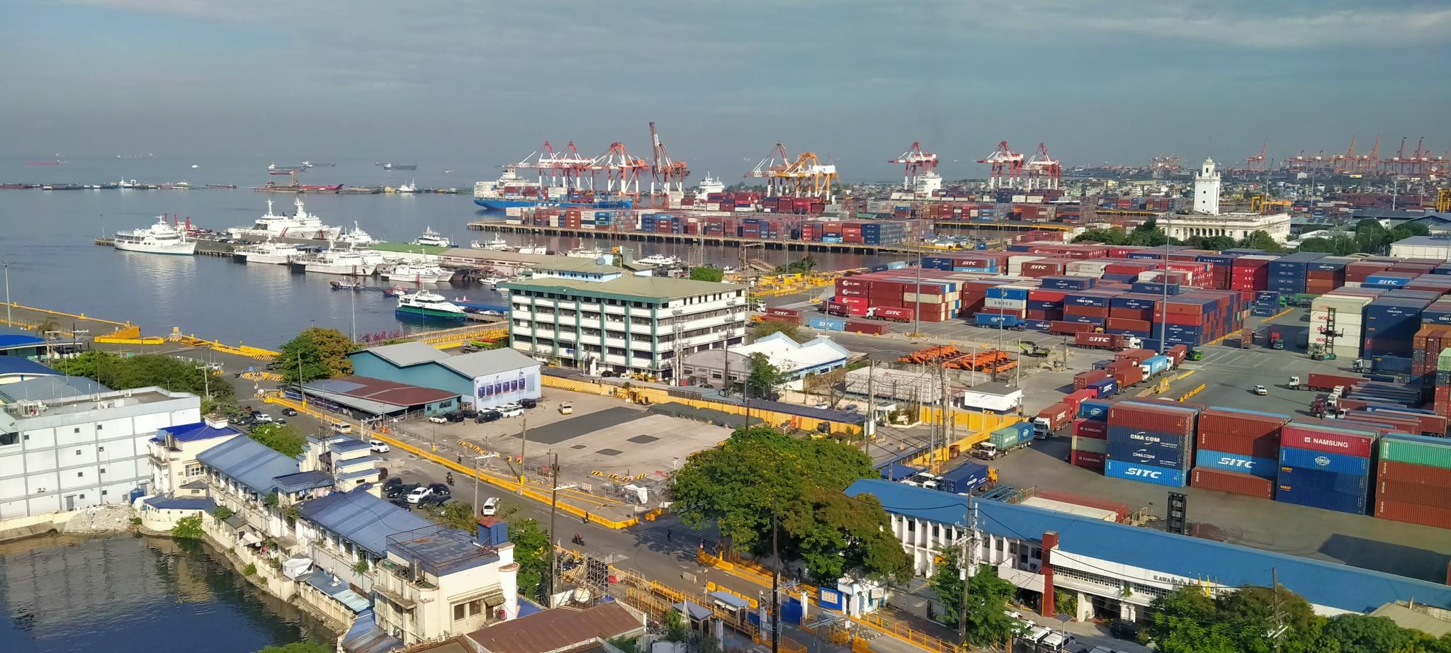 Figure 1. View of Manila’s port area, including Manila South Harbour in the mid-ground and Manila International Container Terminal in the distance (Source: Author, 2024).