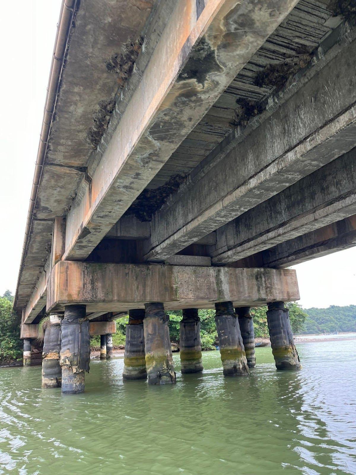 Figure. 1 Pillars of the Ankobra Bridge, visibly in a state of decline. (Source: Zaby Sadhoe, 2025)